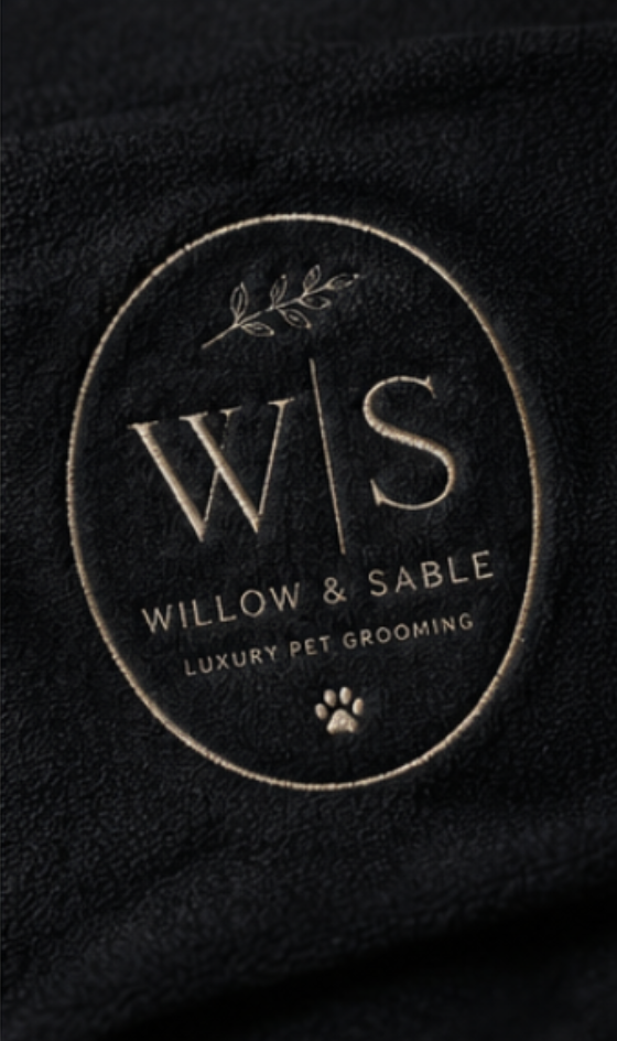The Willow & Sable crest embroidered on a studio towel